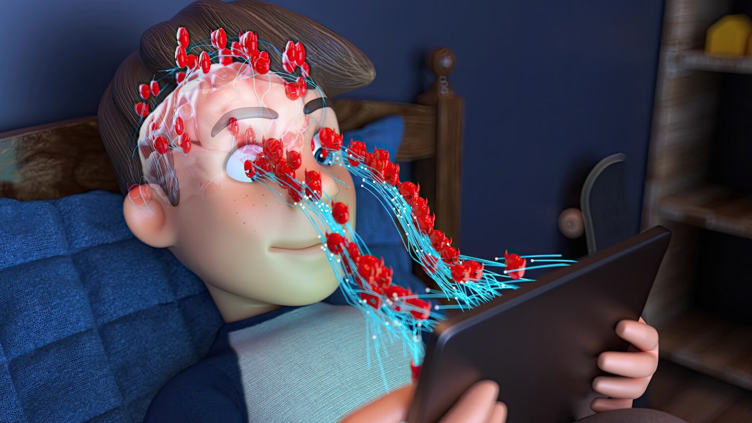 Garçon allongé sur un lit en train de lire une tablette